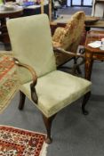 A George III style walnut framed open armchair with upholstered back and seat and shepherd's crook