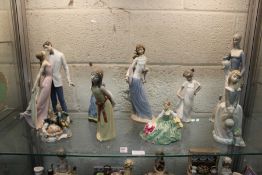 A quantity of Nao, Lladro and other decorative figures.