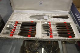 A cased horn handled cake serving set.