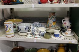A shelf of decorative china.