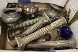 A box of plated items.