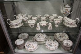 A large quantity of Wedgwood Kutani Crane dinner and tea ware.