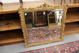 A decorative gilt framed mirror.