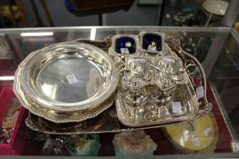 A quantity of plated wares, to include trays and condiments.