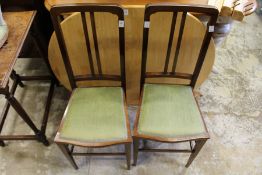 A pair of occasional chairs.