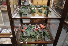 A quantity of military toy vehicles and other die cast toys.