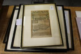 Three small framed and glazed maps.