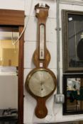 A 19th century mahogany barometer / thermometer with inlaid case with signed silvered dial.