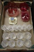 Various glassware to include cranberry glass together with a small gilt decorated coffee cup and