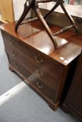 A mahogany chest of two short and two long drawers.