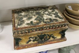 A decorative sewing box.