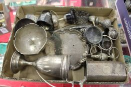 A box of assorted silver.