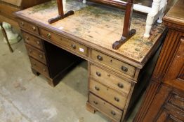 A mahogany pedestal desk.