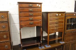 Two mahogany music cabinets.