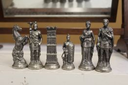 A cast metal figural chess set.