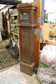 An oak longcase clock case (no movement).