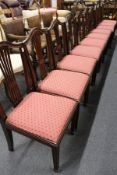 A set of ten Hepplewhite style mahogany dining chairs with drop-in seats.