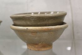 Two early Chinese glazed terracotta bowls.