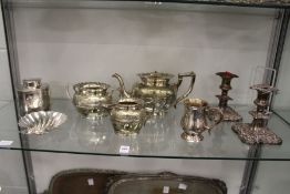 A good Elkington & Co tea caddy, a shell shaped butter dish, a plated three piece tea service and