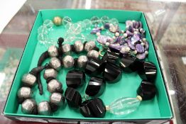 Four chunky necklaces.