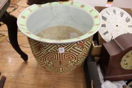 A large Chinese green ground jardiniere (faults).