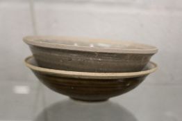 Two early Chinese glazed terracotta bowls.