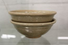Two early Chinese glazed terracotta bowls.