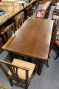 An oak rectangular drawer leaf dining table.