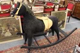 A large rocking horse.