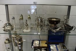 A shelf of plated wares.