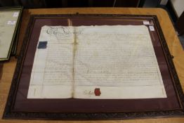 An indenture, framed and glazed.