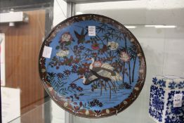 A cloisonne enamel charger.
