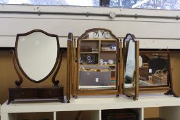 Three dressing table mirrors.