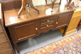 A modern mahogany sideboard.