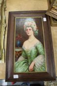 20th century English school, a portrait of a lady, oil on board, in an oak frame.