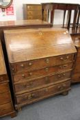 A George III oak bureau (faults).