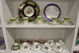 A quantity of decorative coffee cups and saucers and other china.