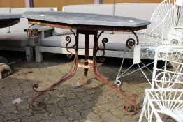 An octagonal top garden table with wrought iron base.