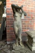 A good large weathered composite garden figure of a semi-nude female.