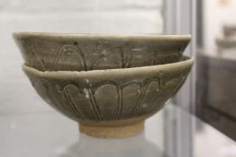 Two early Chinese glazed terracotta bowls.