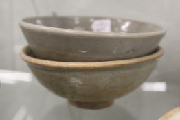 Two early Chinese glazed terracotta bowls.
