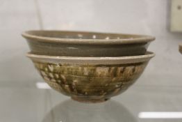 Two early Chinese glazed terracotta bowls.