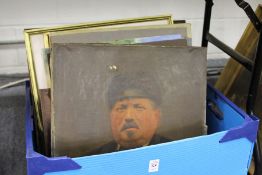 A box of assorted paintings and prints.