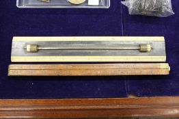 An early boxwood folding liquid measuring stick marked for firkins, hogs, barrels etc. etc. together