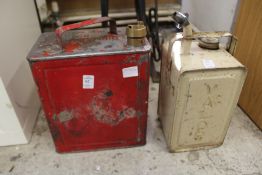 Two old petrol cans.