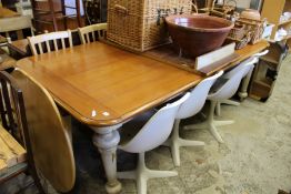 A good large pine and painted kitchen table with extra leaf.