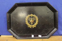A painted black lacquer octagonal shaped tray.