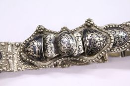 A Russian Niello decorated white metal belt.