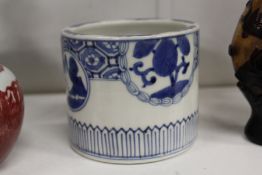 A Chinese blue and white porcelain circular brush washer.