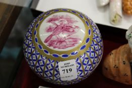 A modern Dresden circular box and cover painted with exotic birds.